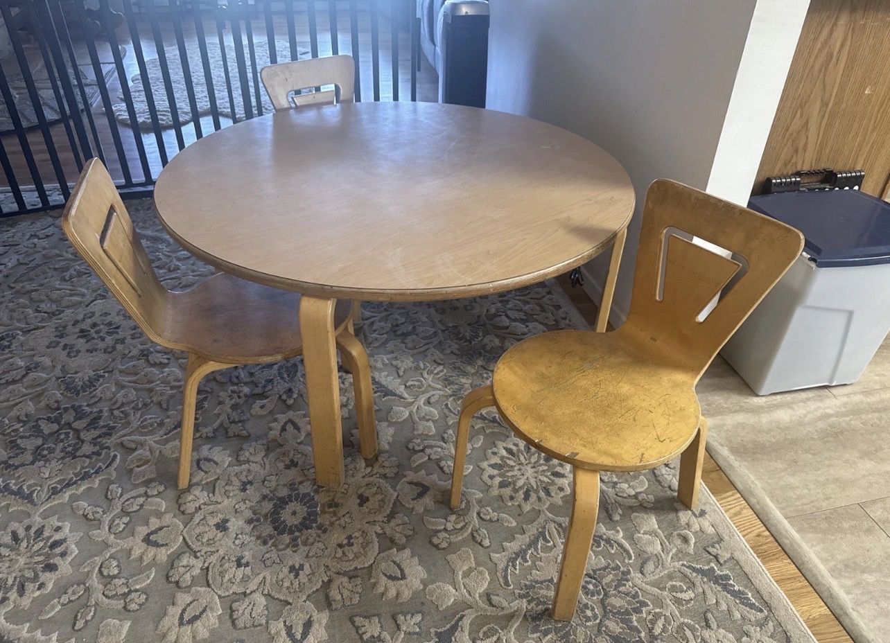 Round Wood Vintage Children’s Activity Table - 42”across Light Finish with 3 bent wood chairs.