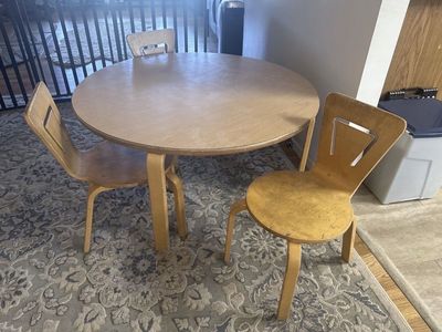 Round Wood Vintage Children’s Activity Table - 42”across Light Finish with 3 bent wood chairs.