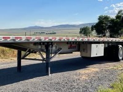 2024 Wilson Flatbed Quad Axle Trailer