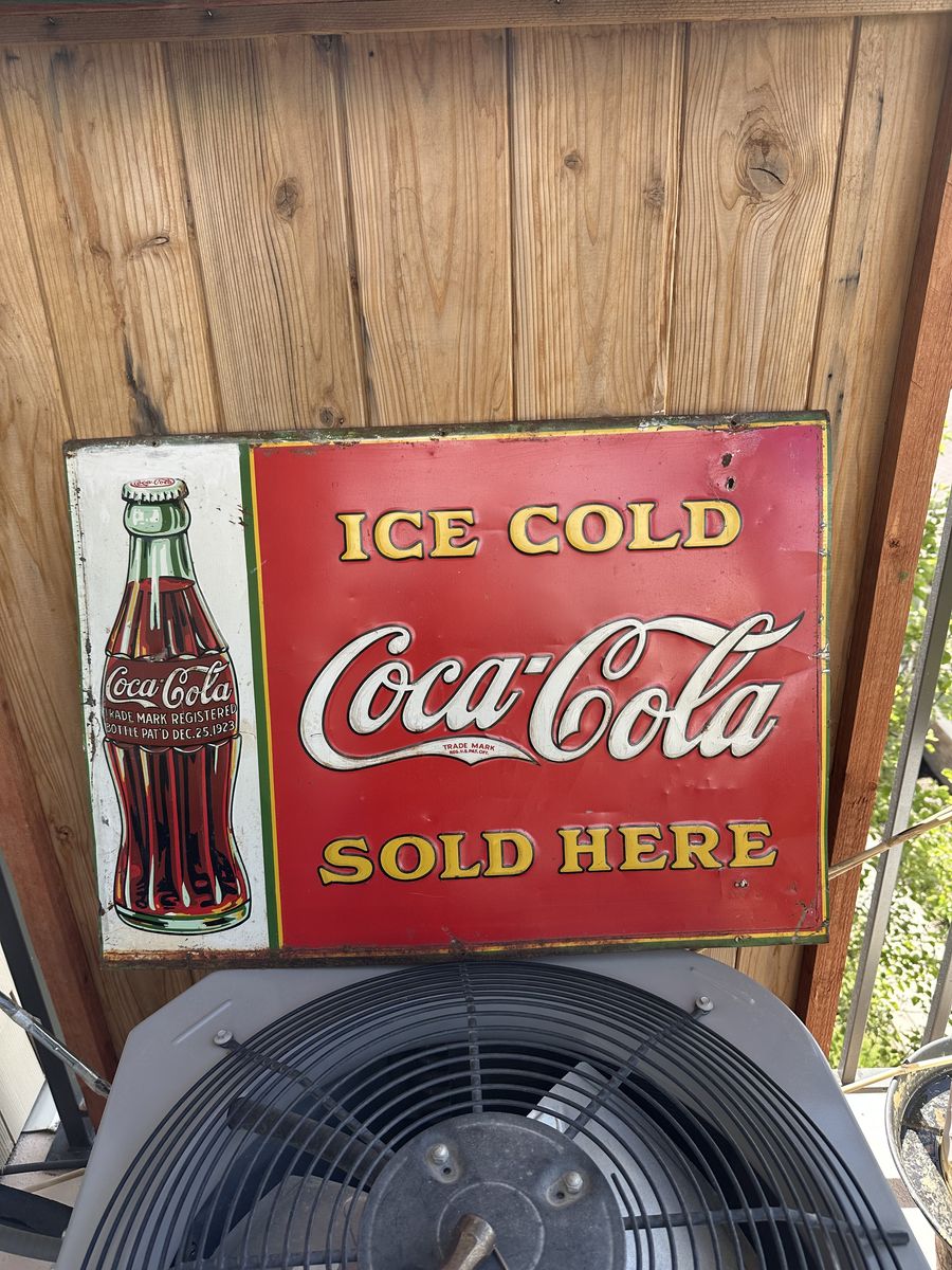 Year is 1930 Embossed Tin Coca Cola Sign