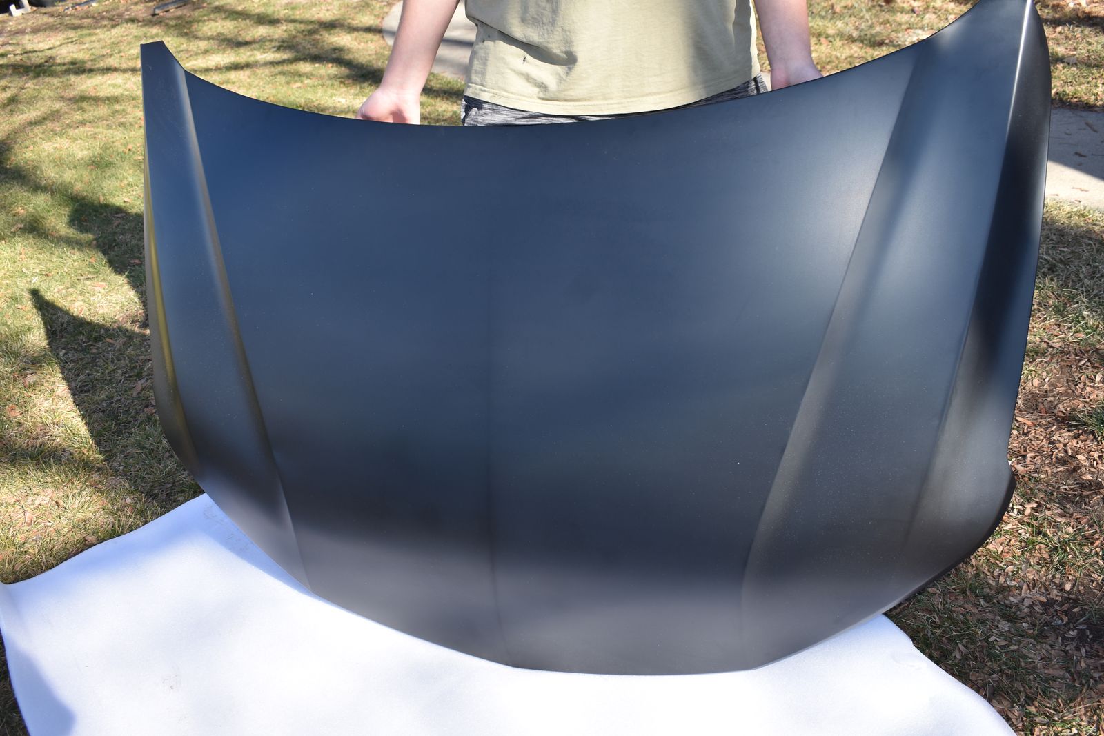 Unpainted car hood possibly 2017 – 2020