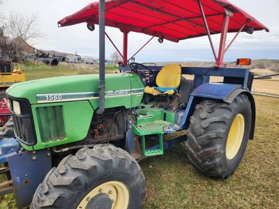Brower 5160 Sod Harvester and John Deere 5210 Tractor