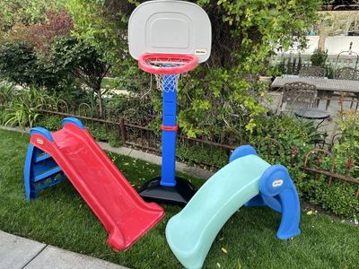 Kids outdoor toys slides, basketball hoop $25.00 each.