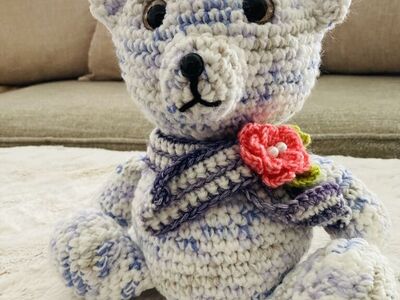 Handcrafted Teddy Bear with Flower