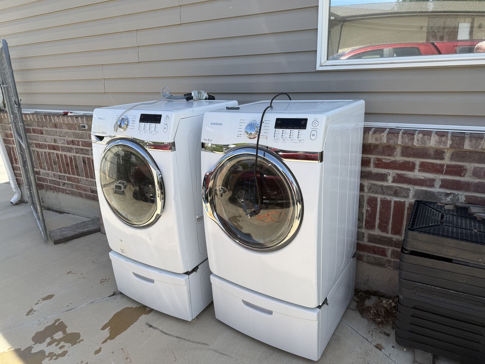 LG front load washer and Natural gas dryer with pedestals