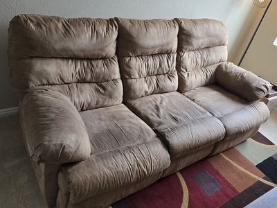 Couch with 2 recliners, bought it new. need gone