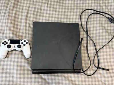 Sony PlayStation 4 (PS4) Slim 1TB Console with White Controller & Power Cable