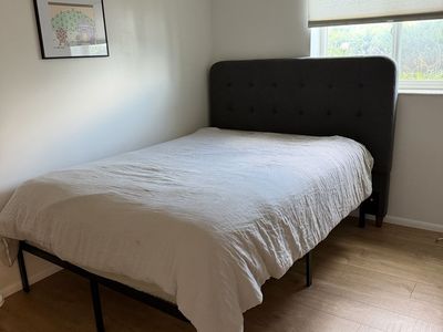 Queen Size Bed Set: Mattress, Black Metal Frame, & Gray Tufted Headboard
