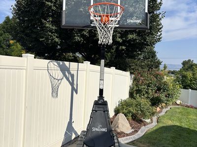 Like New! Spalding 54” Portable Basketball Hoop System with Glass/Acrylic Backboard