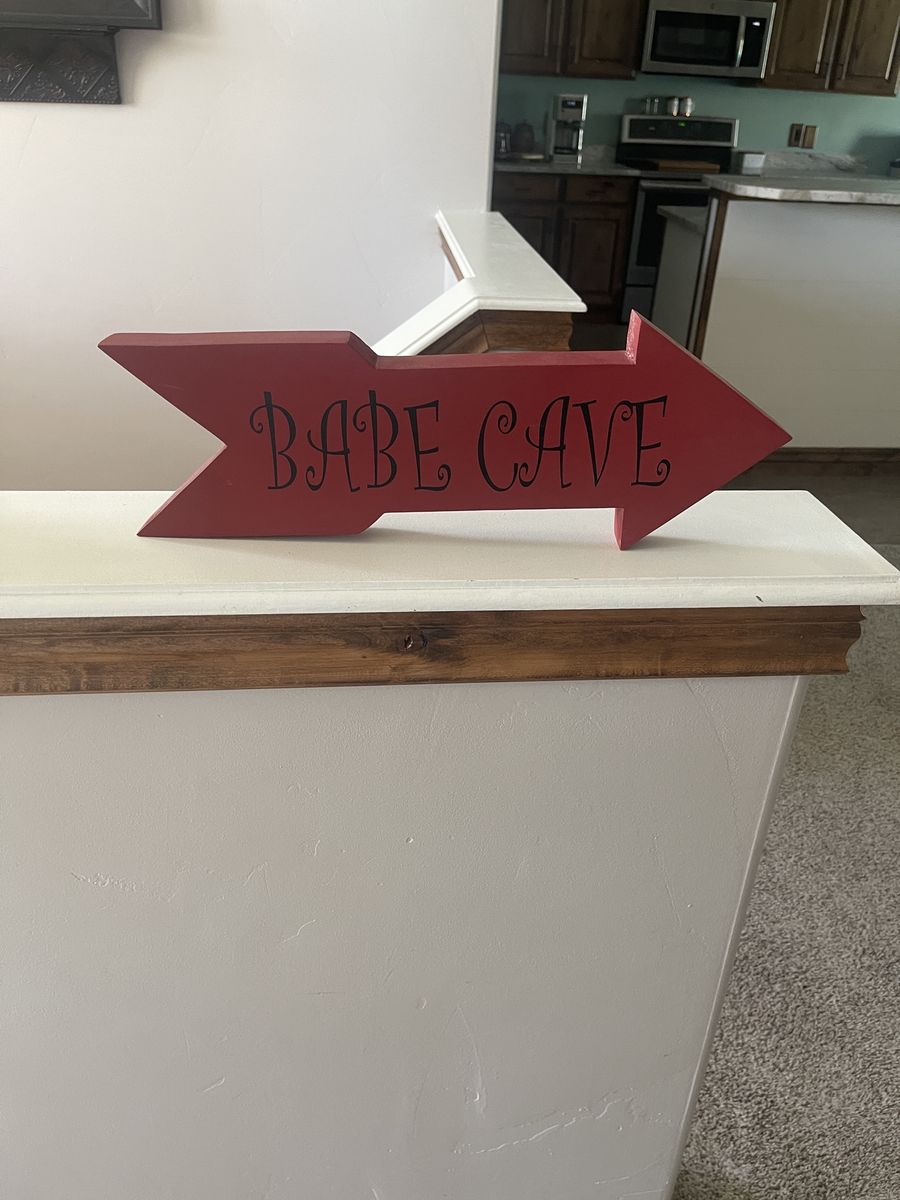 Red Wooden Arrow Sign - Babe Cave