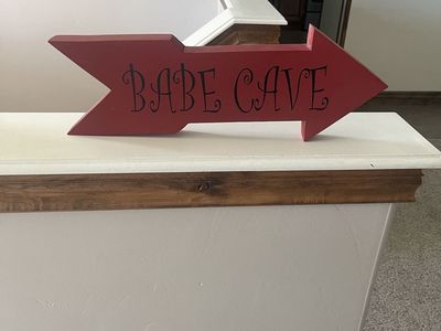 Red Wooden Arrow Sign - Babe Cave