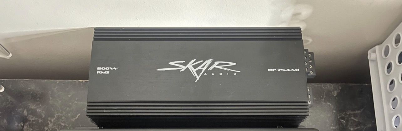 4 channel Skar audio amp 