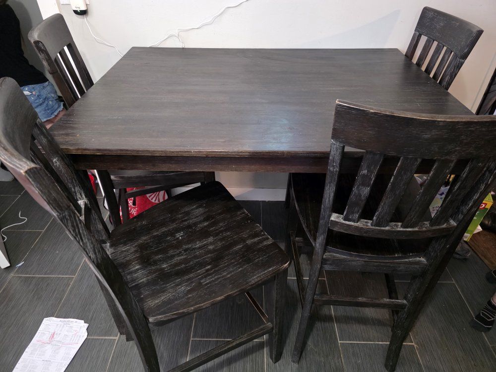 Counter Top dinning table with 4 chairs