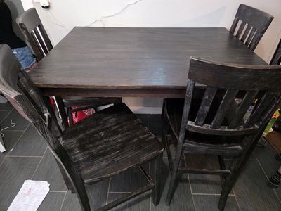 Counter Top dinning table with 4 chairs