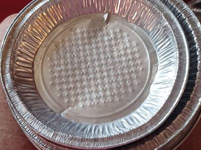 Stack of Aluminum Foil Pie Tins . Disposable Baking Pans!