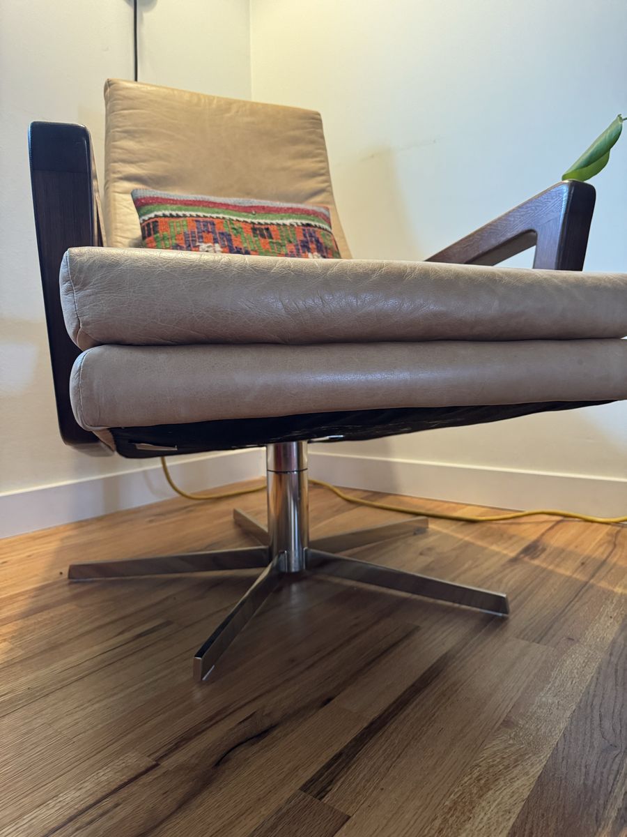 Leather mid century swivel chair