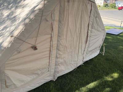 Inflatable tent and queen size mattress that goes inside
