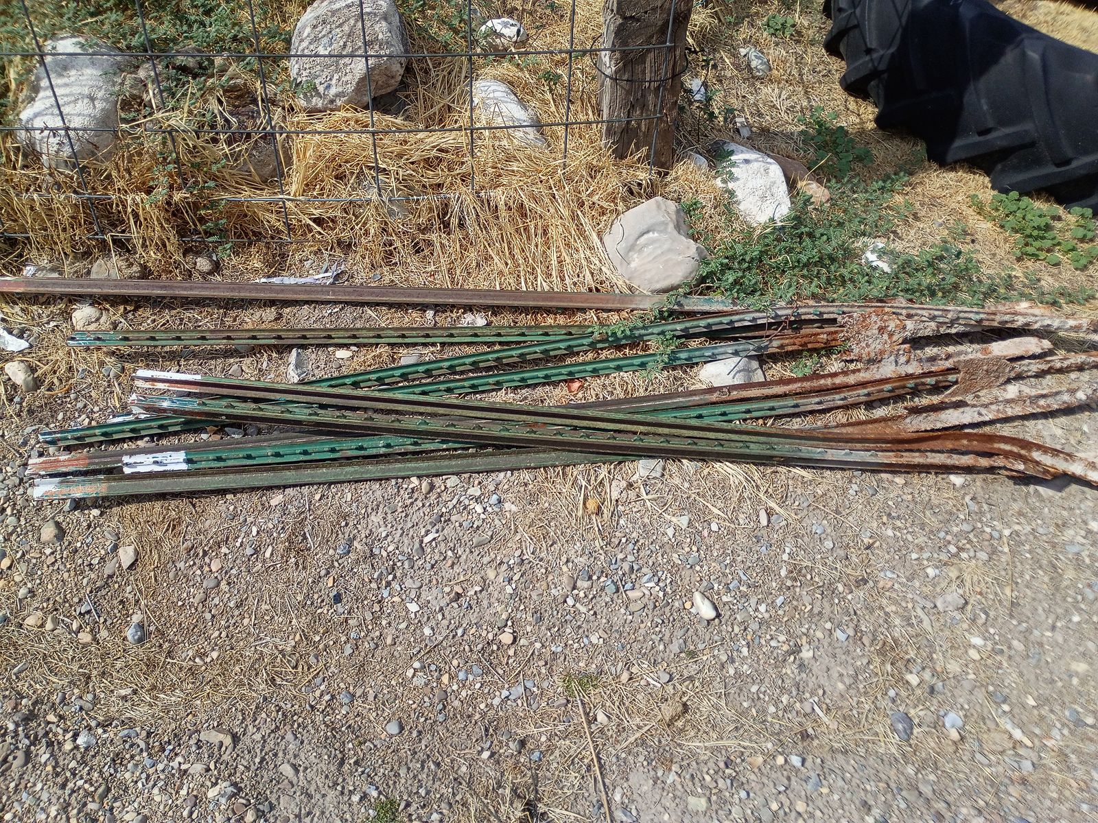 FREE!!!   9 Fence Posts, some are bent up.