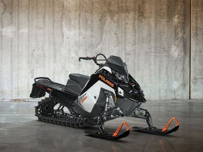 2027 Polaris® 650 RMK SP 155 ES White Lightning / Gloss Black / Orange Burst