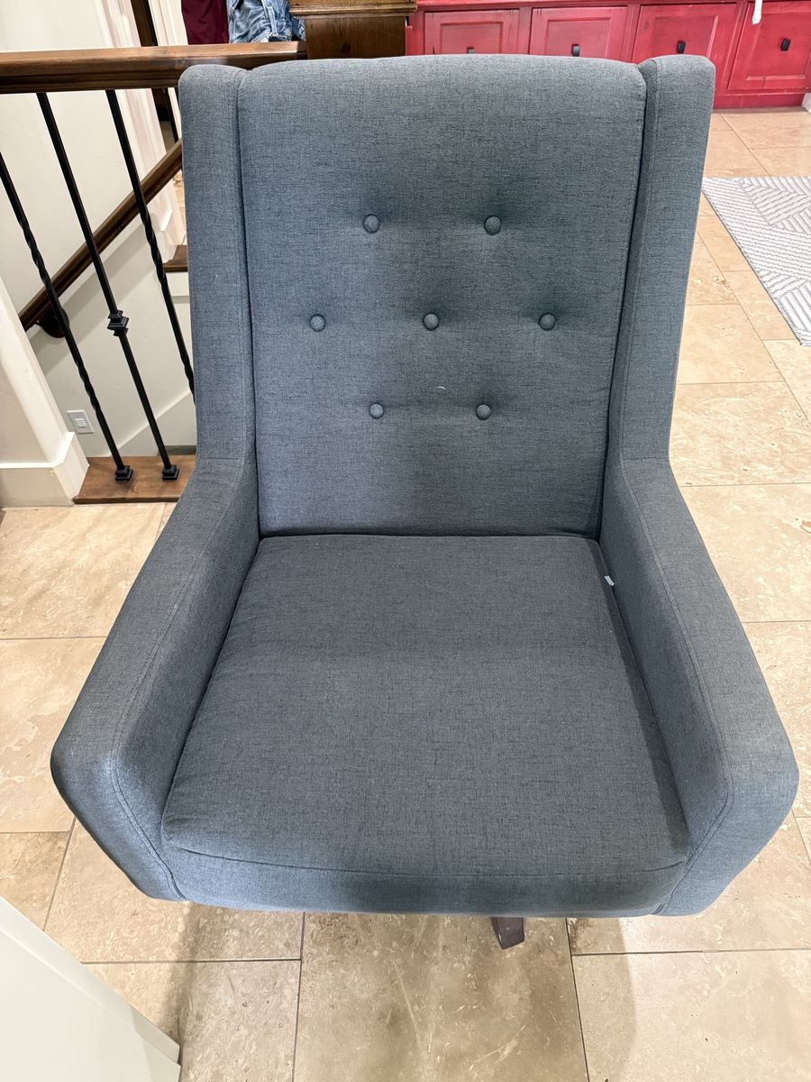Grey swivel chair