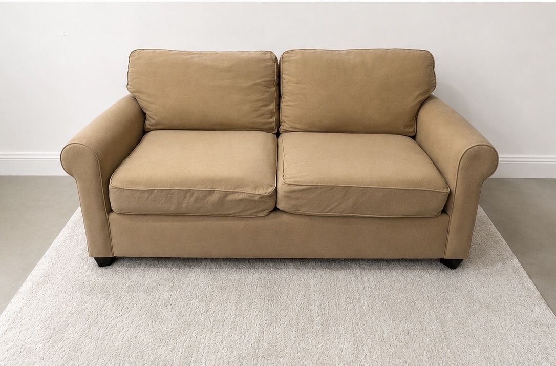 Tan 2 cushion love seat