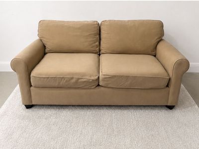 Tan 2 cushion love seat