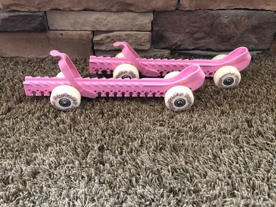 Pink RollerGard Adjustable Ice Skate Guards with Wheels - Protect and Roll