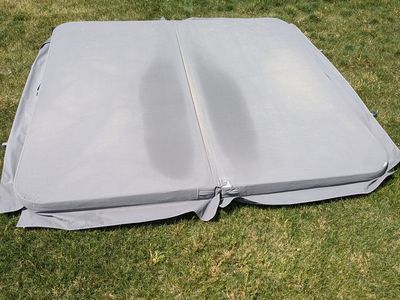 used hot tub cover, 93x94 inches with rounded corners. fabric cover, minor tears with no water intrusion into foam.