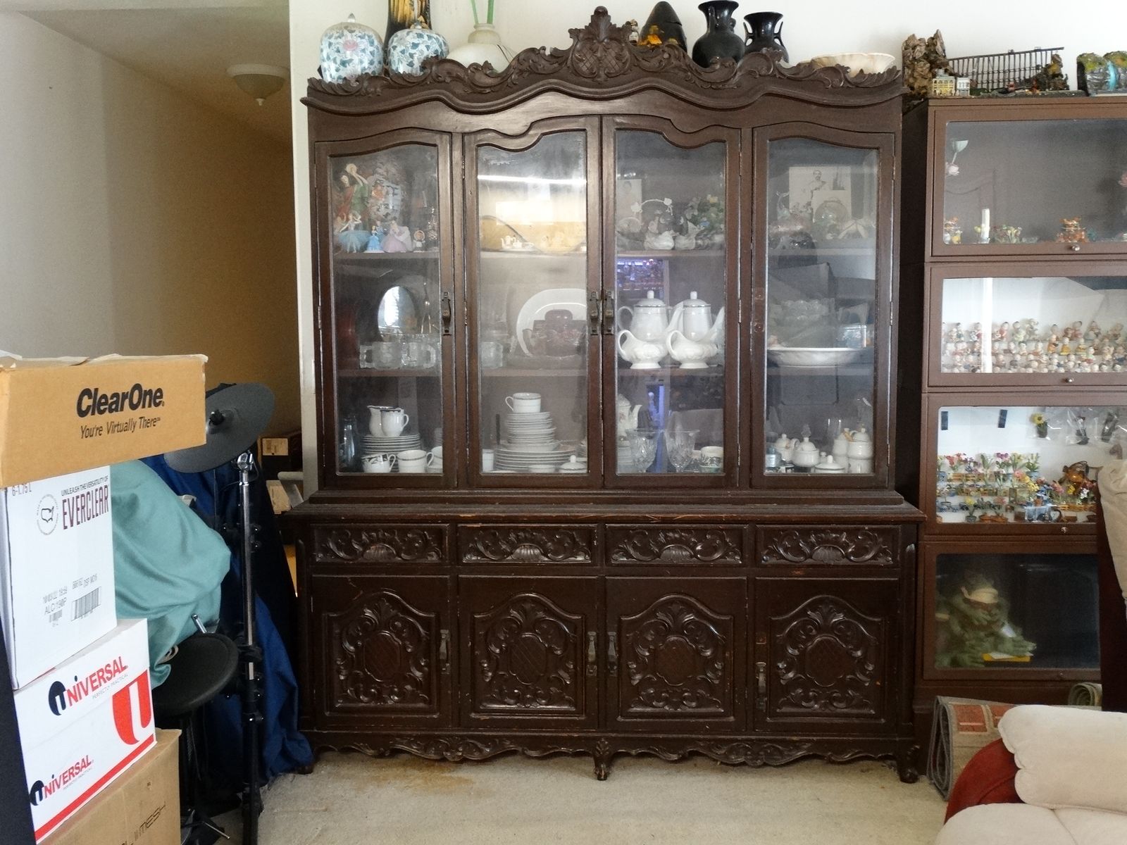 Vintage China Cabinet with 4 glass panel door, displaying a collection of dinner ware and decotive items. (Cabinet only)