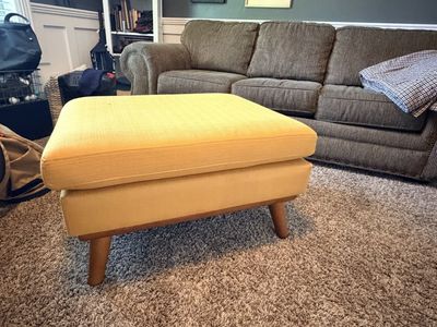 Mid-Century Modern Yellow Upholstered Ottoman with Tapered Wooden Legs