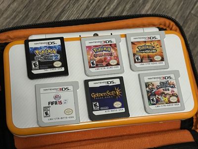 Nintendo 2DS XL (White/Orange edition) + Games