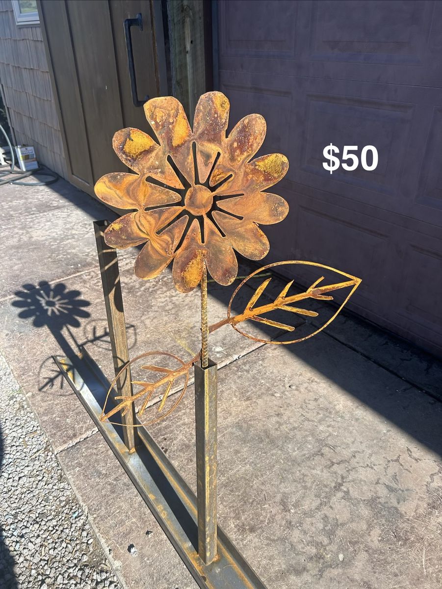 Metal rusted patina yard flower with leaves
