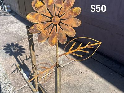 Metal rusted patina yard flower with leaves