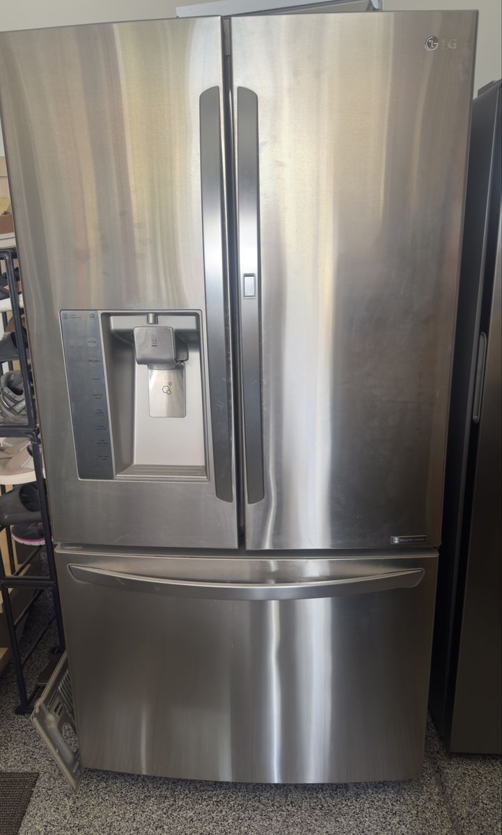LG French Door Refrigerator with Ice Maker & Water Dispenser - Stainless Steel LG refrigerator runs but does not get cold.