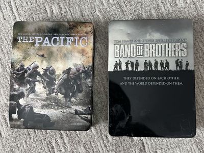 Band of Brothers, DVD 8 disc collection. The Pacific DVD 10 disc collection.