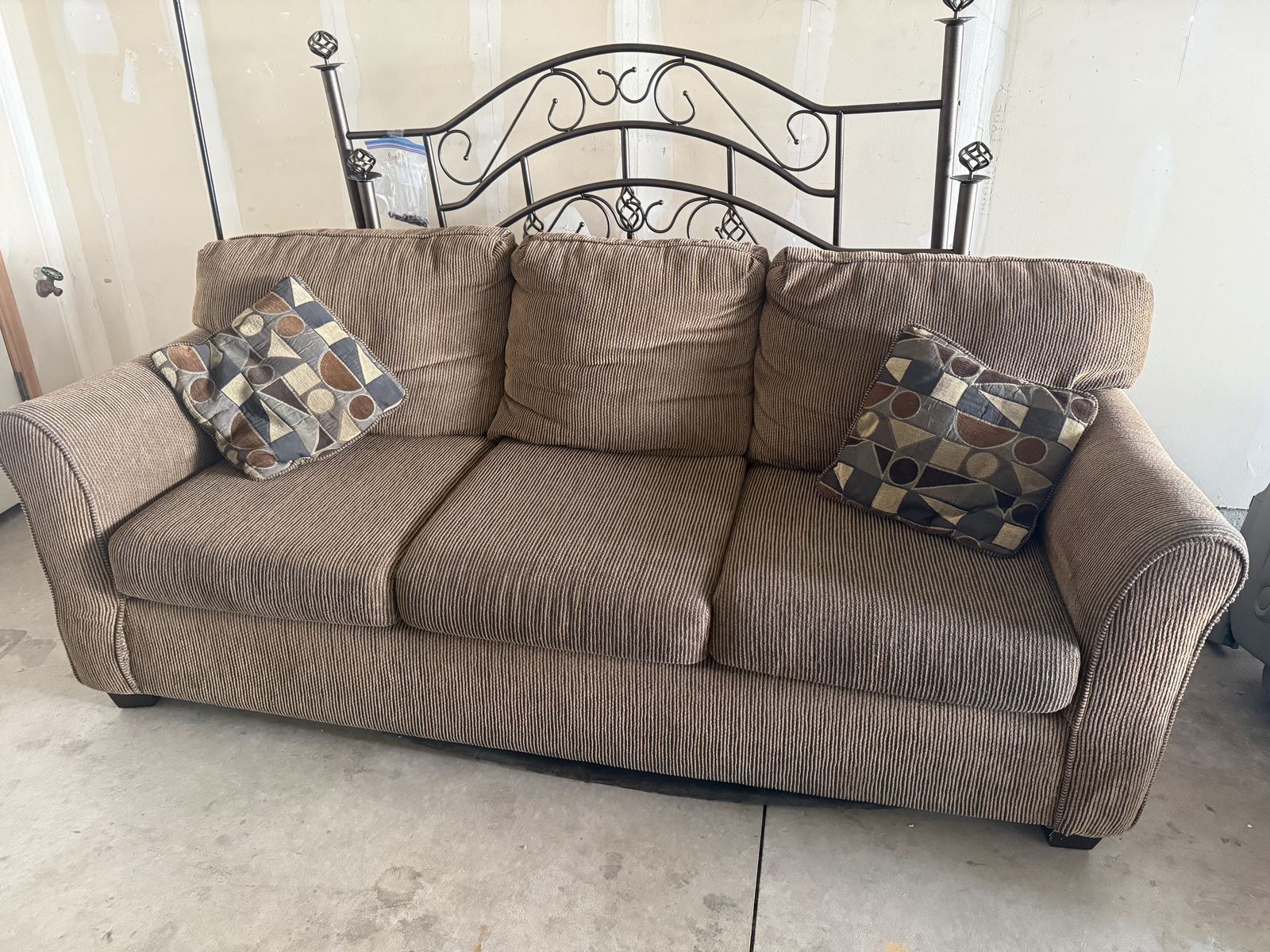 Beautiful brown cloth sofa and love seat