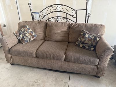 Beautiful brown cloth sofa and love seat