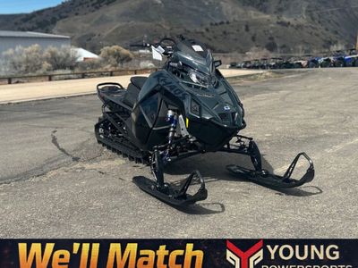 2026 Polaris® Patriot Boost RMK Khaos 155 Gloss Black / Blue Dusk