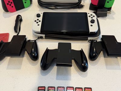 Nintendo Switch OLED Model Bundle with Dock, Charging Grips, and 6 Games - Excellent Condition- $390