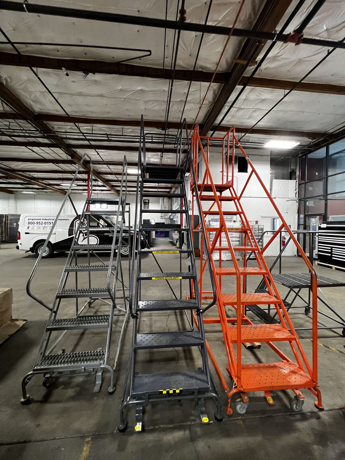 New/Used Pallet Jacks, Rolling Ladders, rolling carts and warehouse protectors