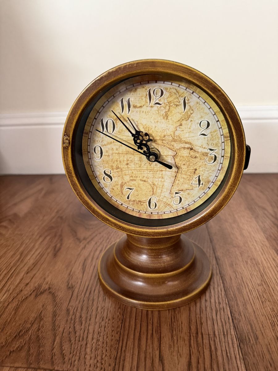 Clock for table or mantle 8.5 inches high and 6 inches wide. Excellent condition.