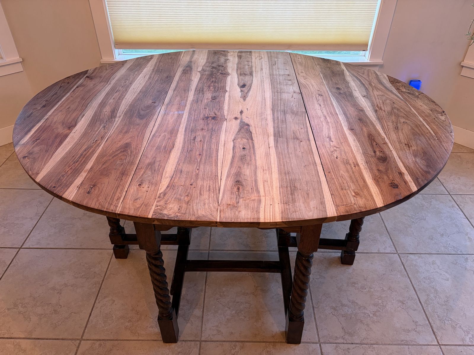 Large Round Wooden Dining Table with Barley Twist Legs and Drop Leaf Design
