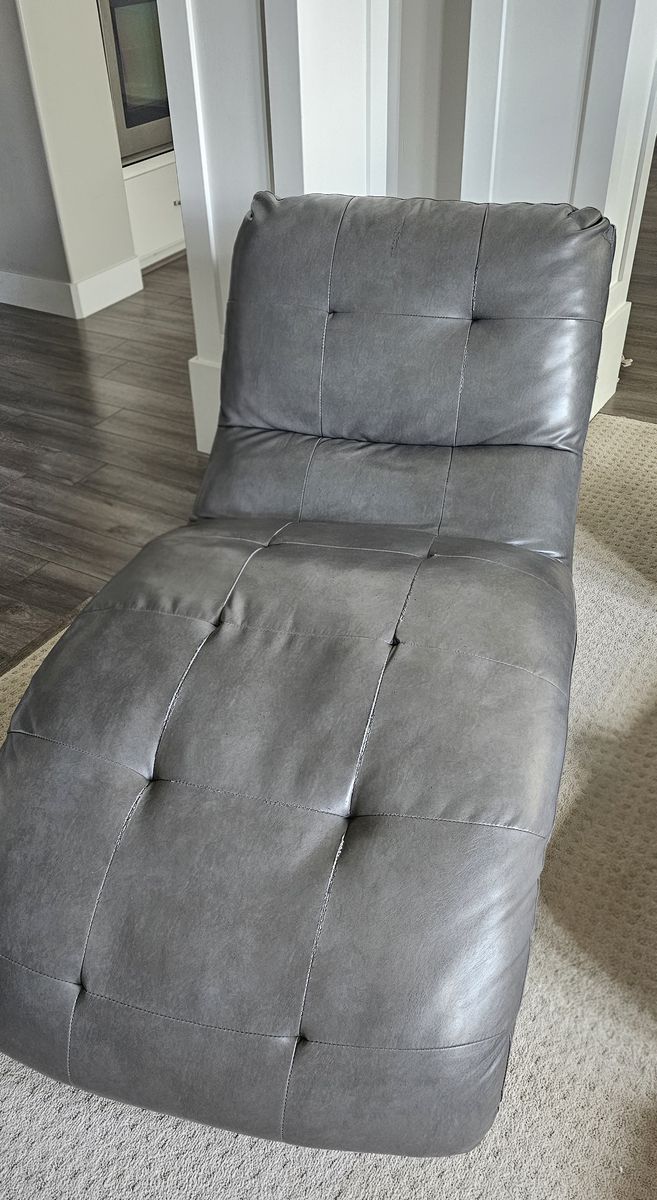 Grey Faux Leather Tufted Chaise Lounger Chair.  Still in pretty good condition