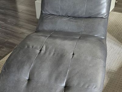 Grey Faux Leather Tufted Chaise Lounger Chair. Still in pretty good condition