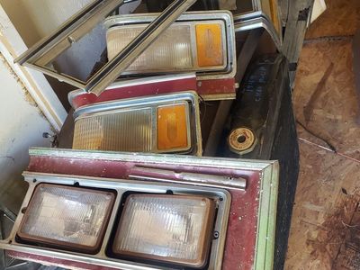 1976 Caddy front light trim. Rear Wheel covers