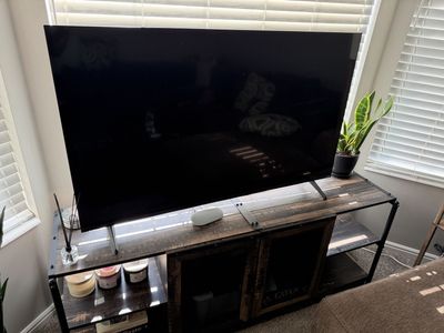 Vizio Smart Flat Screen Television with Stand Feet and TV stand