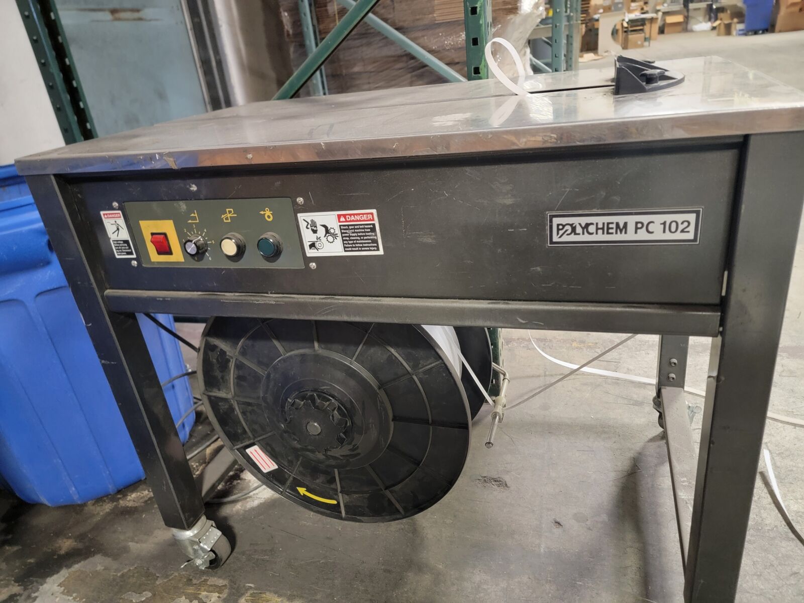 Polychem PC-102 Automatic Strapping Machine — Commercial Warehouse Use