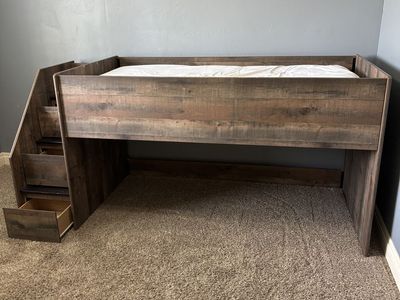Youth Twin Bed with step-drawer-storage Elevated with a "Pirate Hide Out"