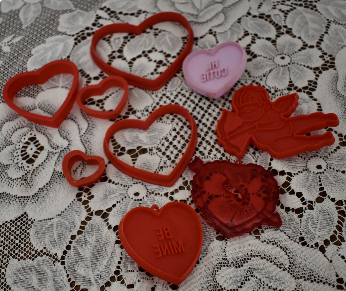 A Set Of 9 Nice Vintage Heart And Valentine Shaped Plastic Cookie Cutters With One Cupid Angel
