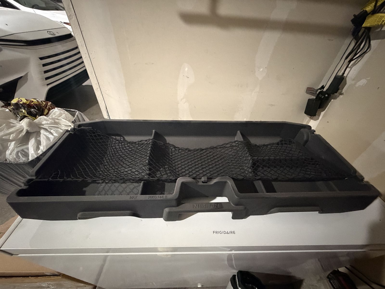 Nissan Frontier storage bin